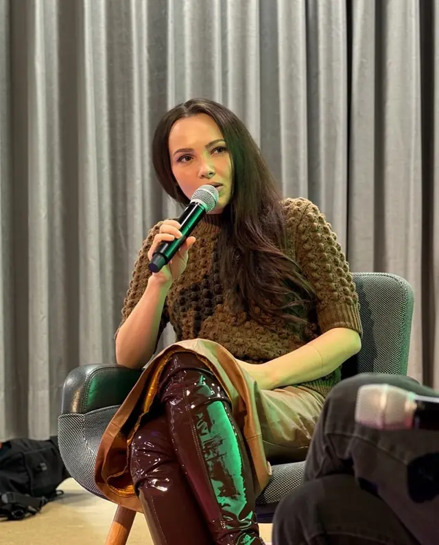 Xenia Vogt speaking on a panel